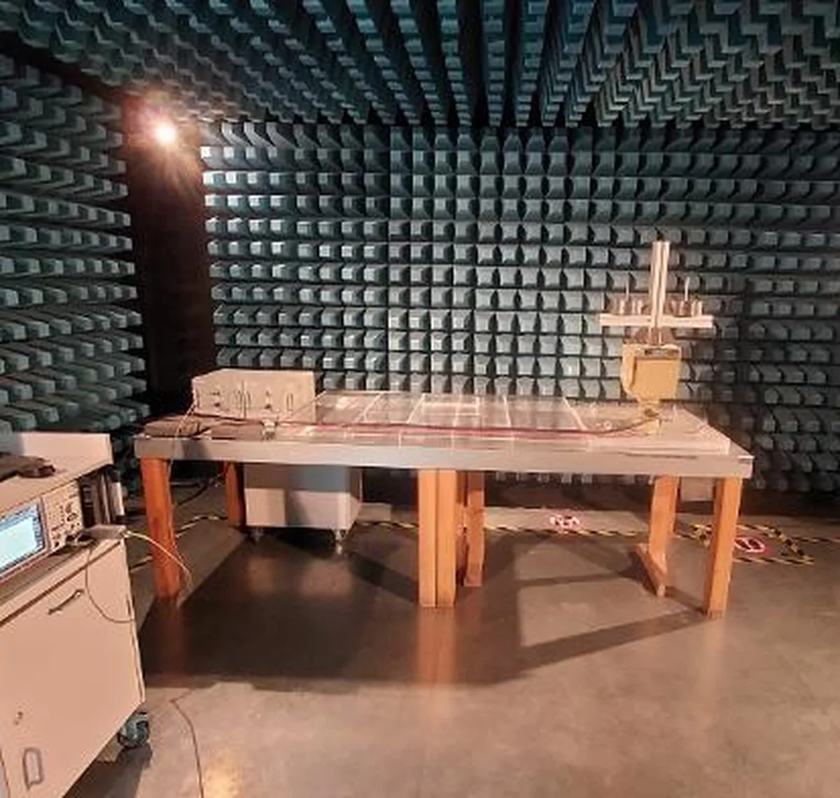 Unit under test inside an EMC anechoic chamber