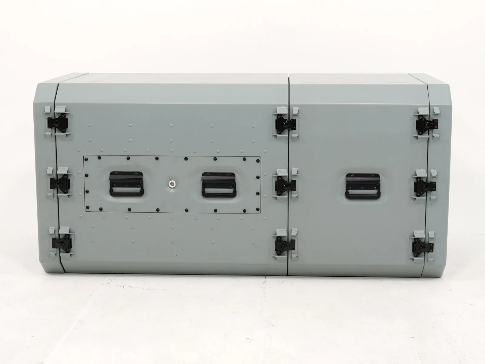 Closed climatic rack cabin, long side forward, on a plain studio background
