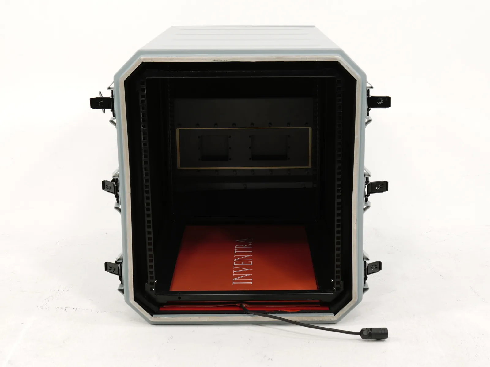 Cabin with the front cover removed, showing the 19-inch rack rails and the red mounting tray