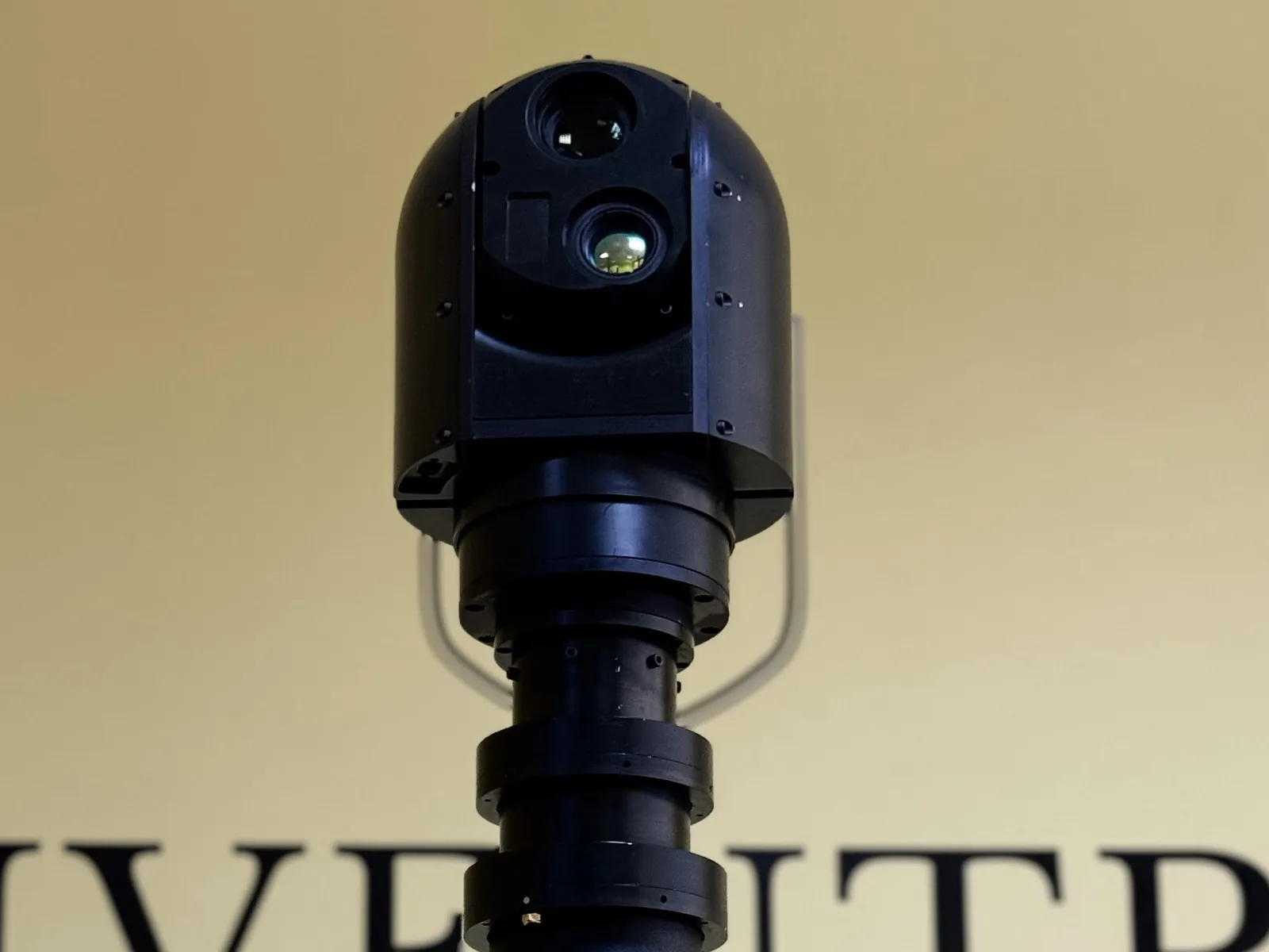 Same configuration head on, with the locking collars and the gimbal interface hub readable