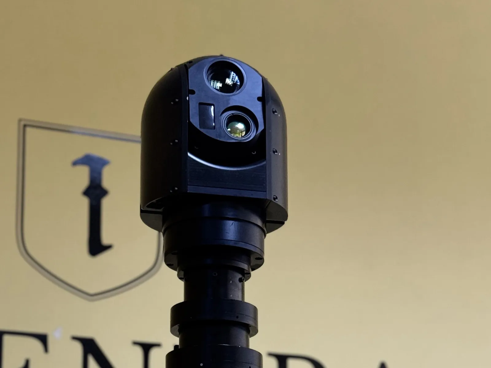 Lower section of the mast body with the base and rotation disc, showing the mounting interface