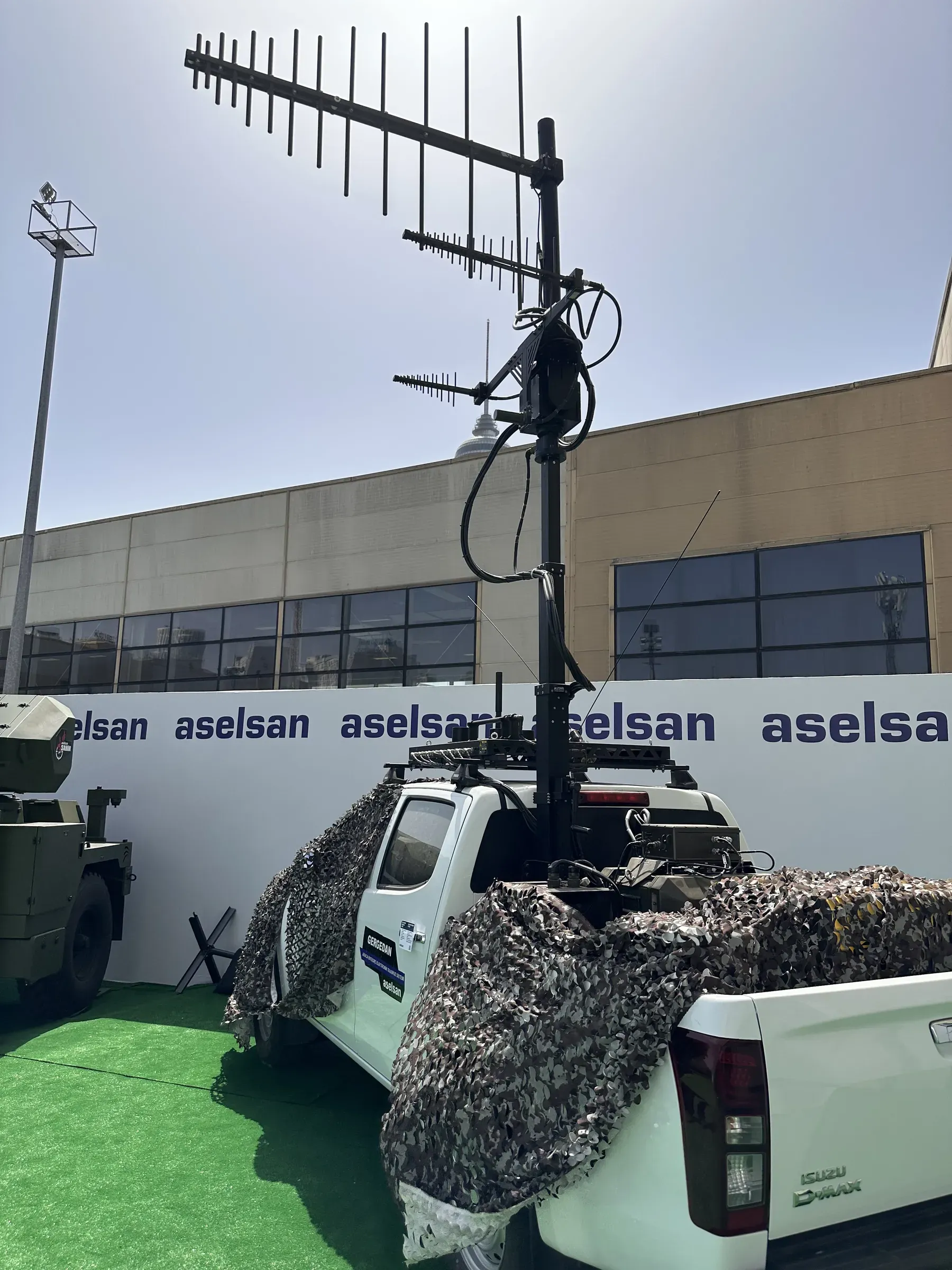 The antenna boom against the sun
