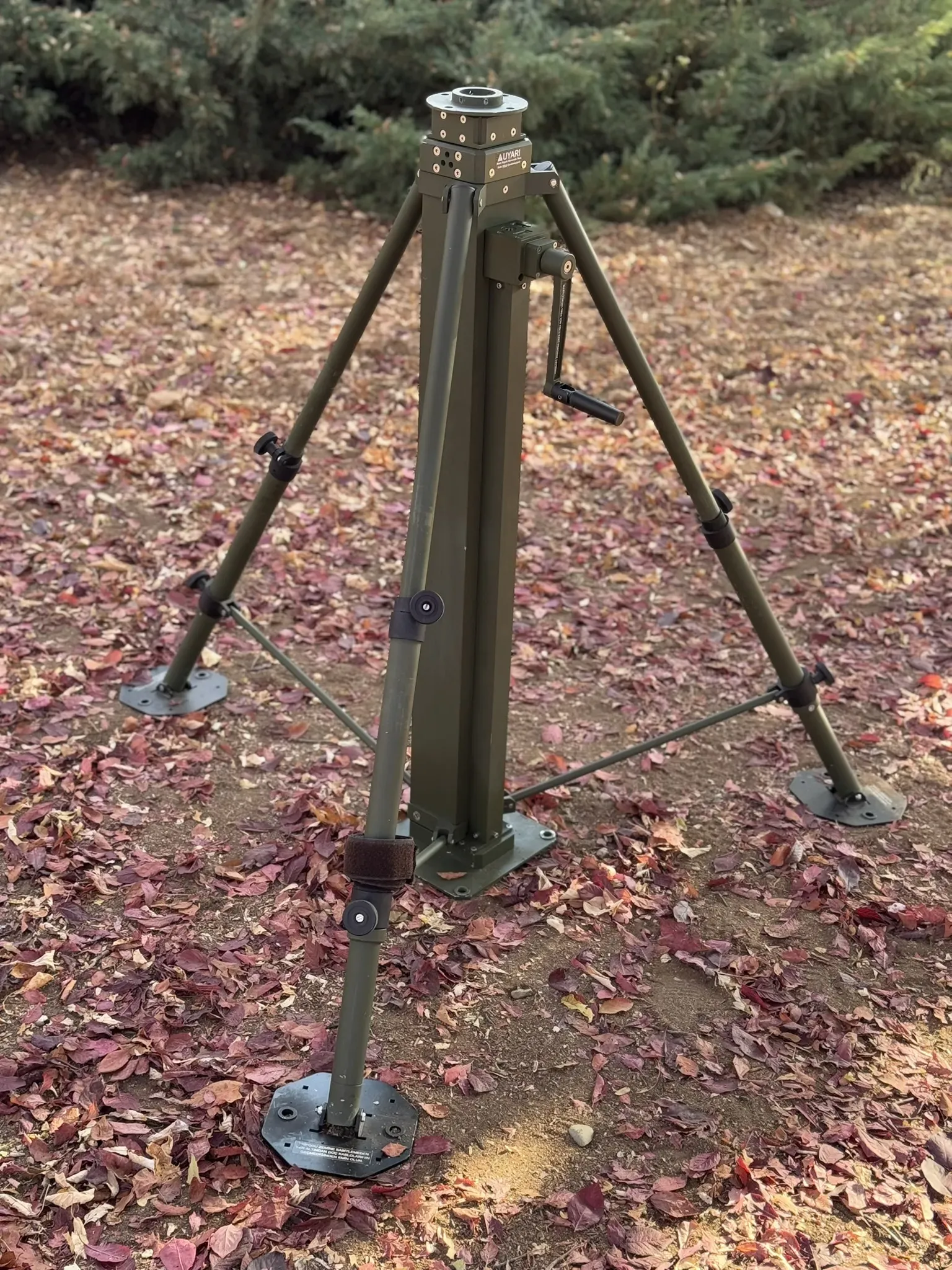 The legs opened into a tripod, column still down