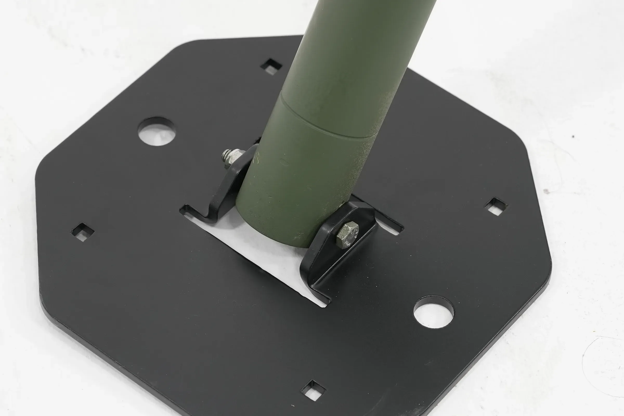 The foot bolted to its plate