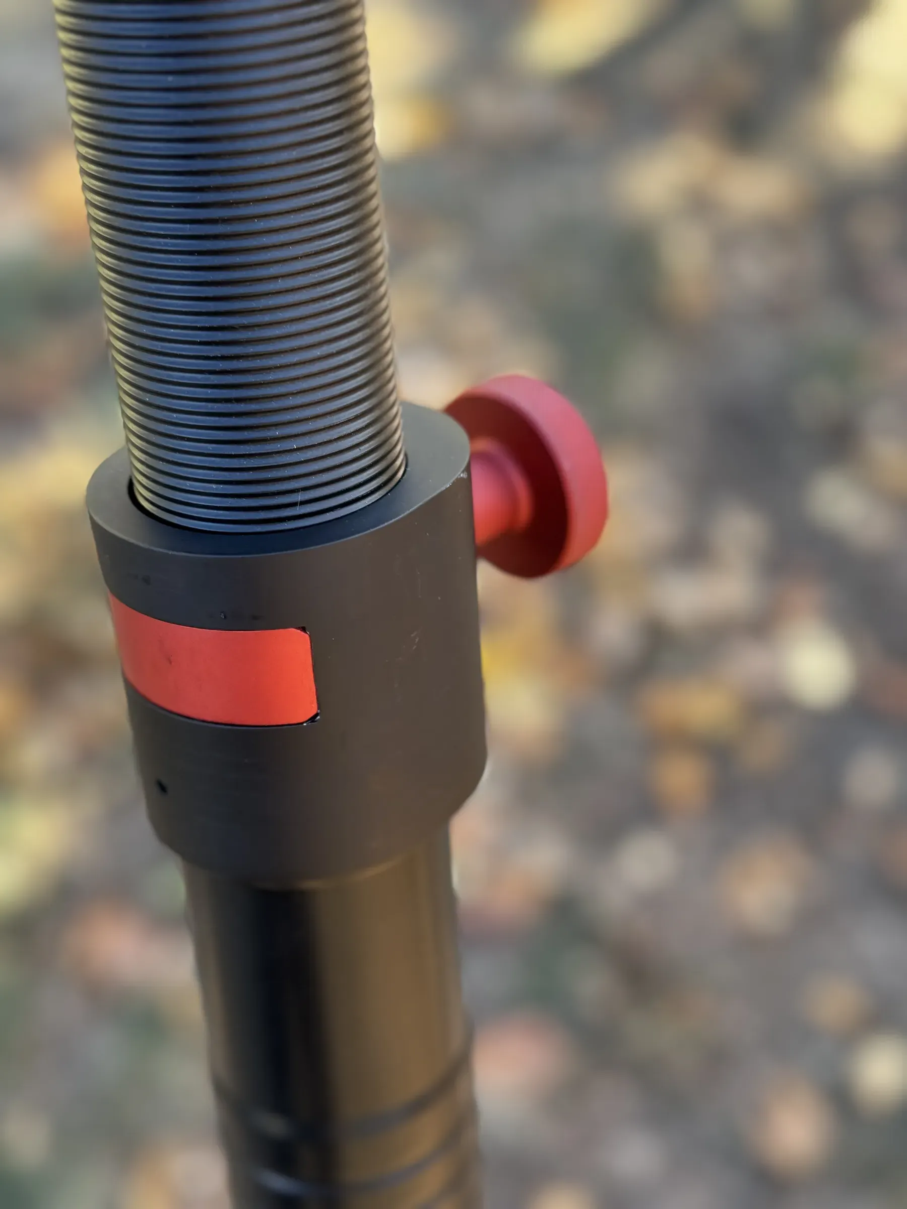 The red knob at the section joint