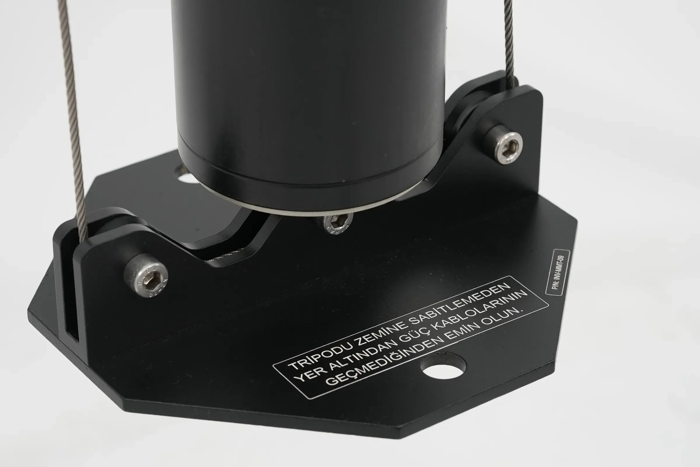The base plate and its warning text