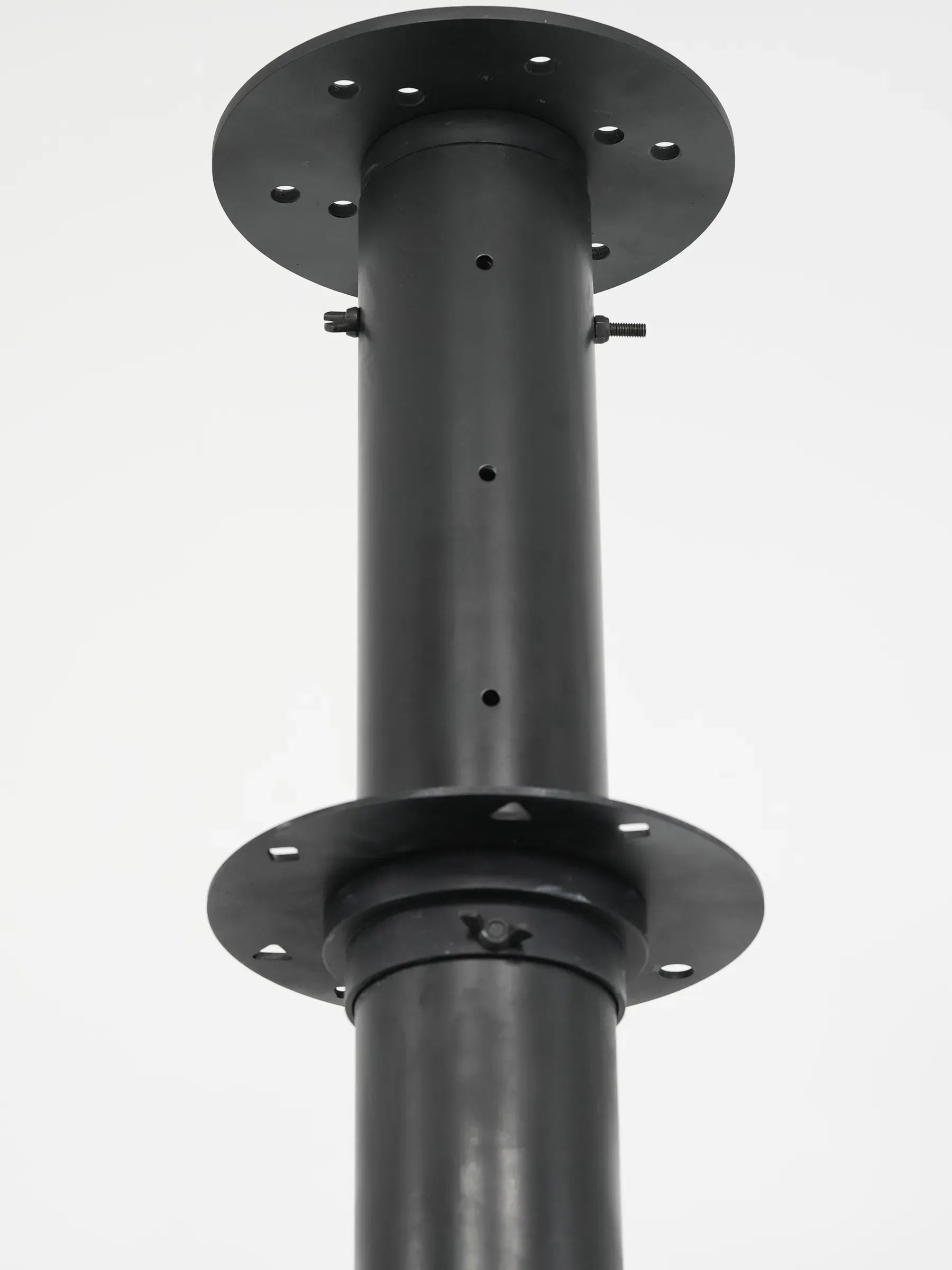 The mounting plates at the top of the column