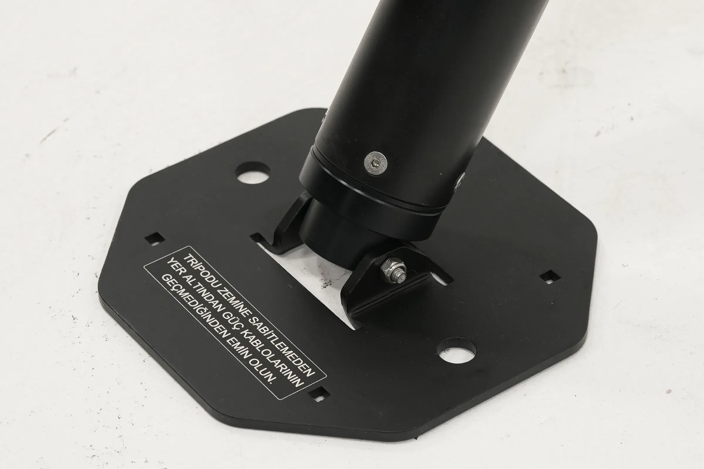 The leg locked into its octagonal foot