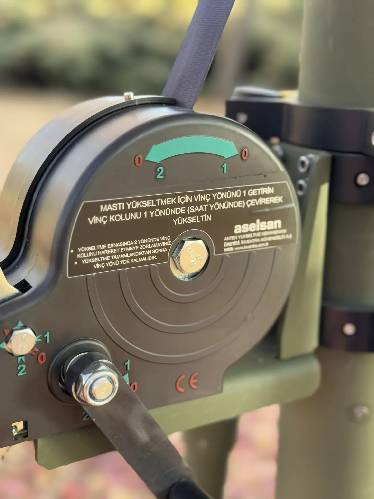 Close-up of the hand winch drum with Turkish operating instructions and an ASELSAN maker label.