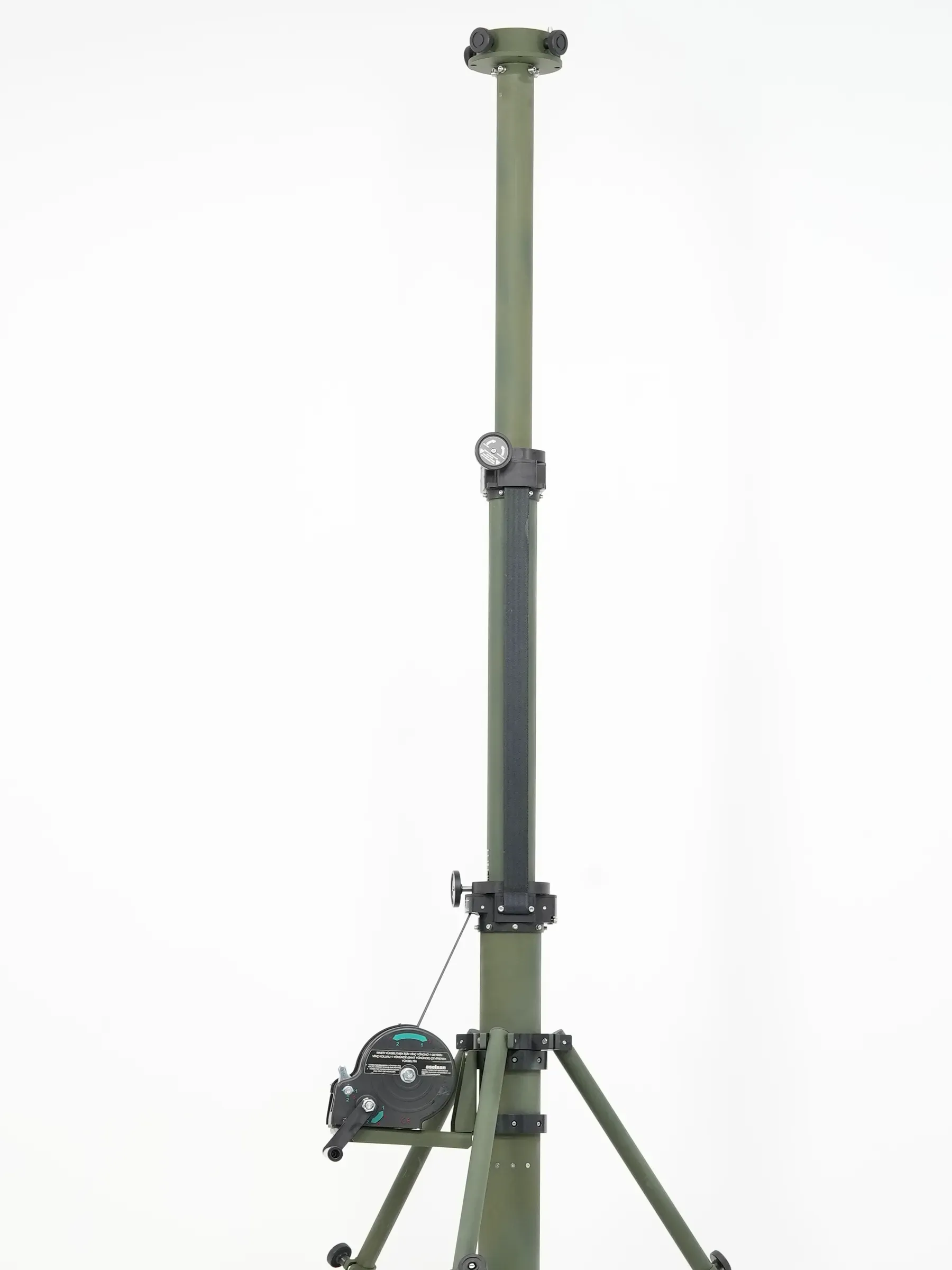 Full olive green telescopic crane-arm mast standing extended on three splayed legs with hand winch fitted.
