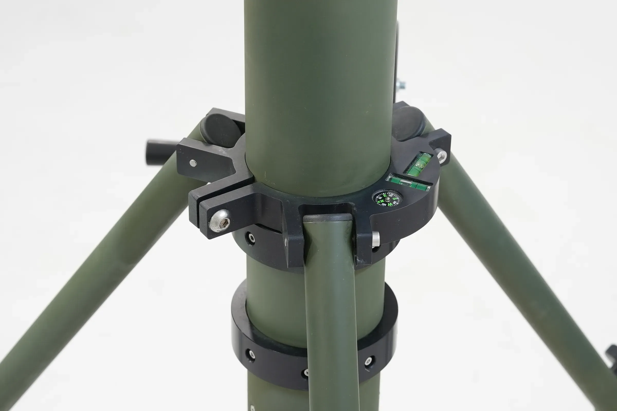 Clamp collar and leg attachment brackets on the lower section of the olive green mast tube.