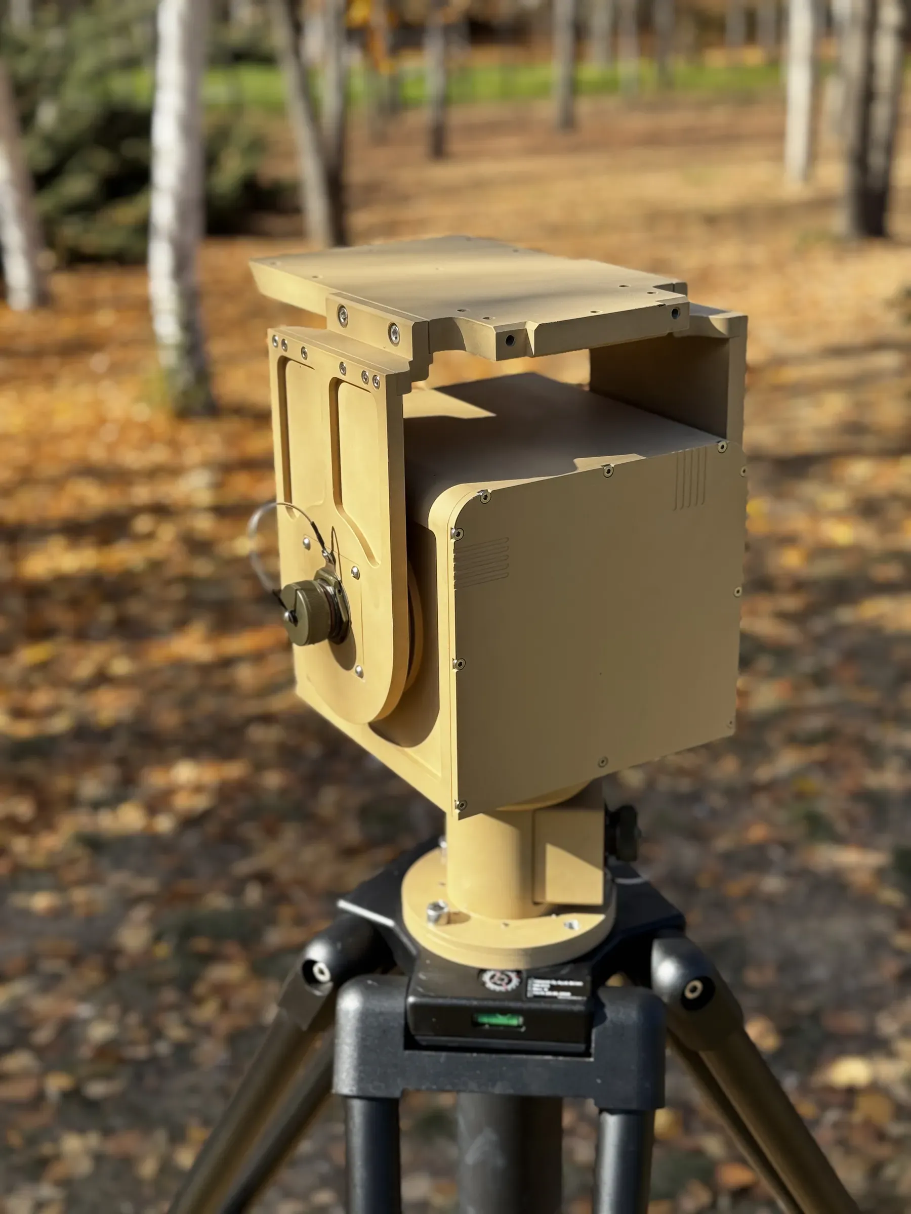 PED10 on a tripod in the woods