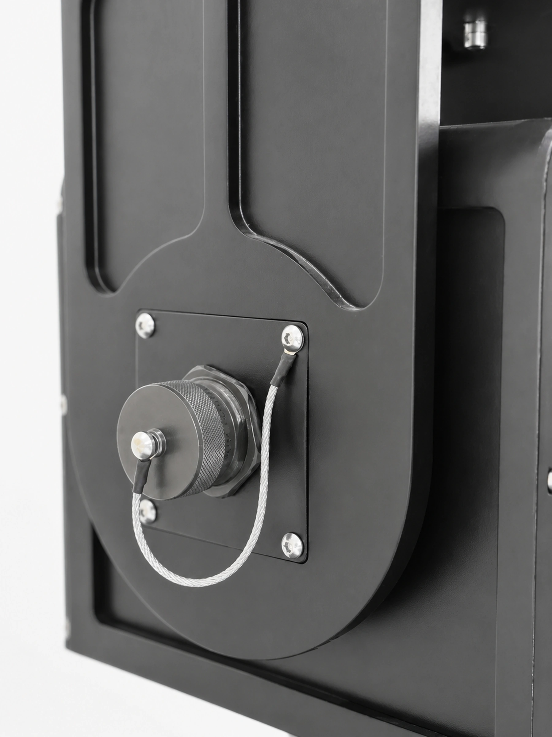 The capped connector on the side arm