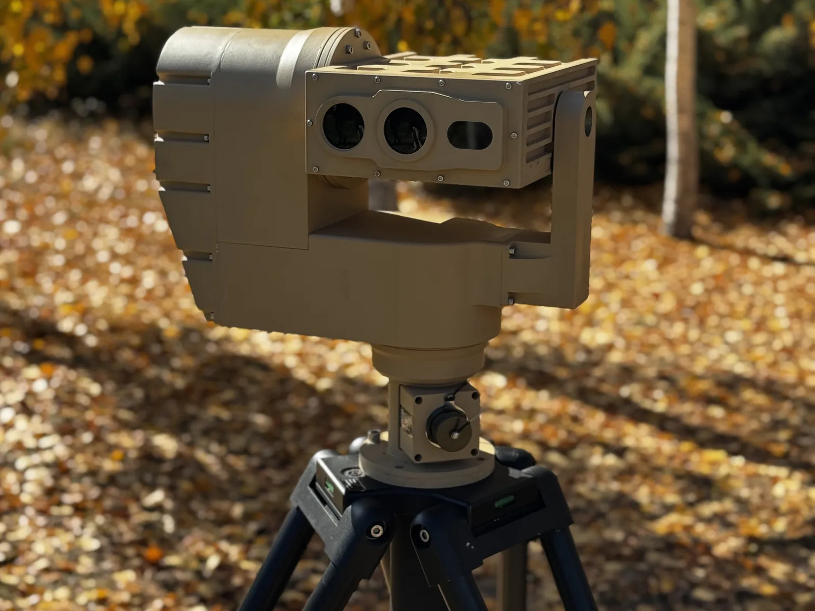 Full height on a TMM10 tripod in the field, front three-quarter — setup and scale