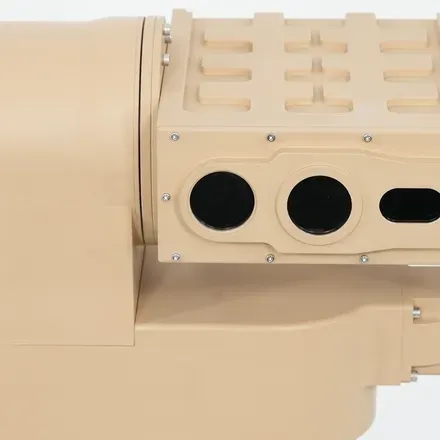 Profile view of the PED12 sensor housing with three optical windows.
