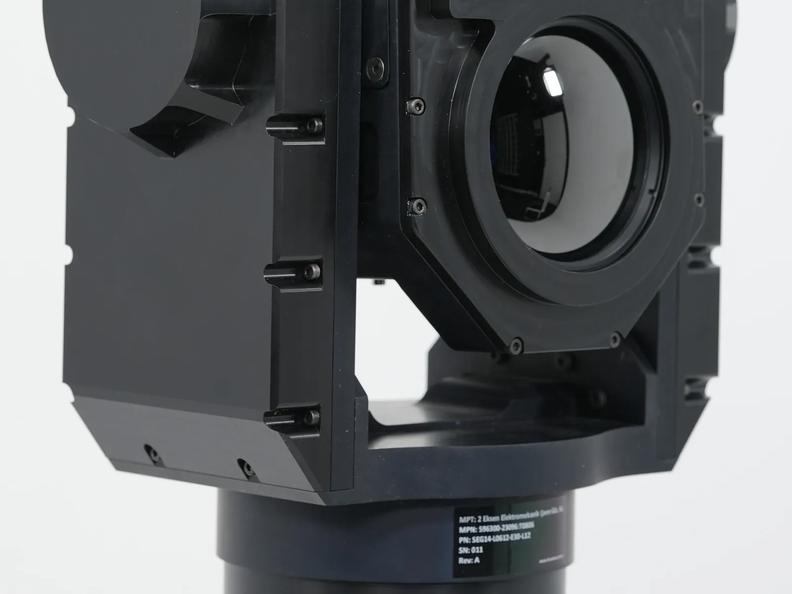 Gimbal at three-quarter angle with the identification label on the base and the mast interface visible