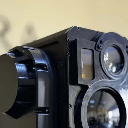 Close view of the SEG14 laser window among adjacent lens barrels.