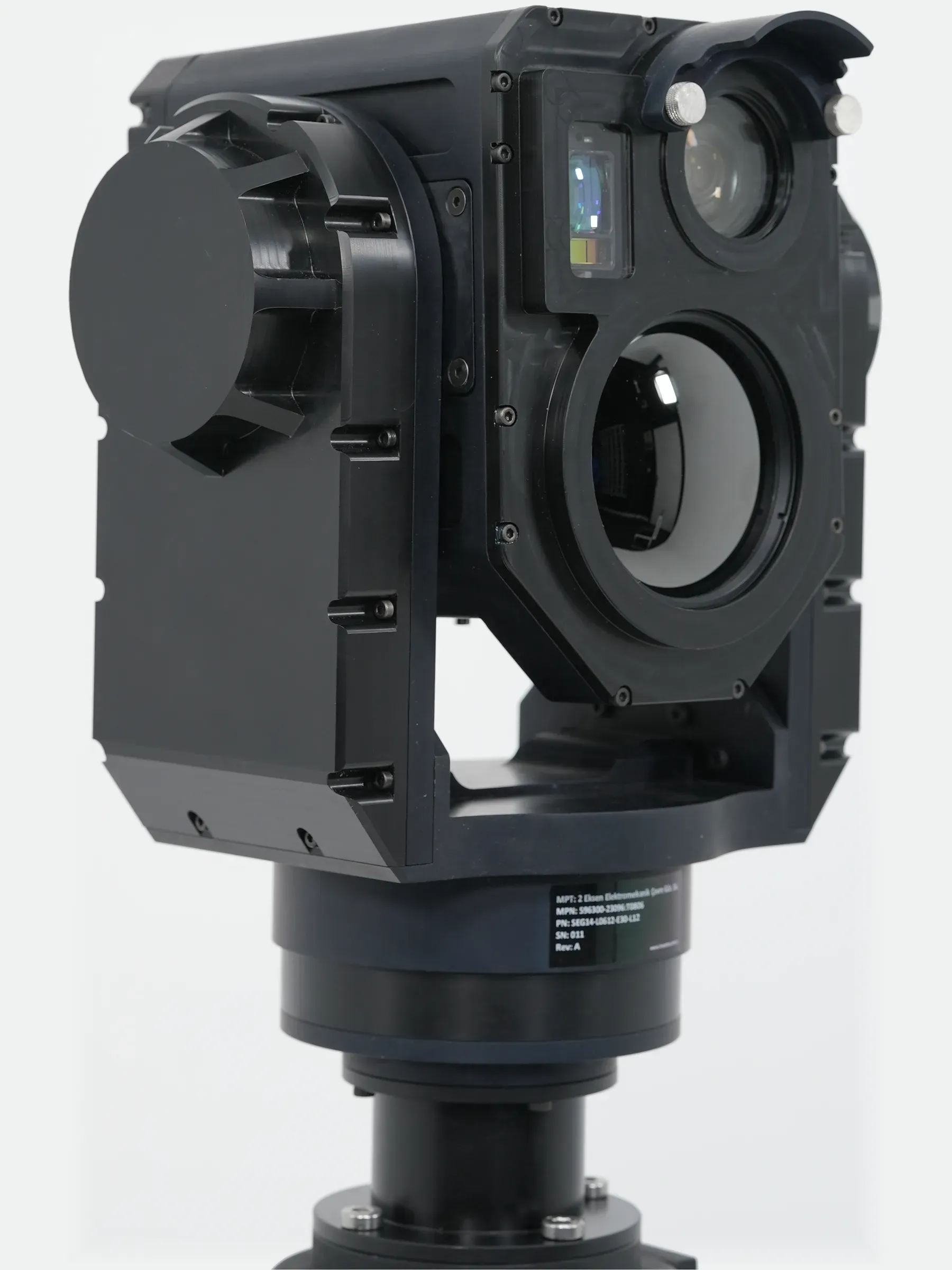 Side view of the SEG14 gimbal on a pedestal, lens hood and optics facing right.