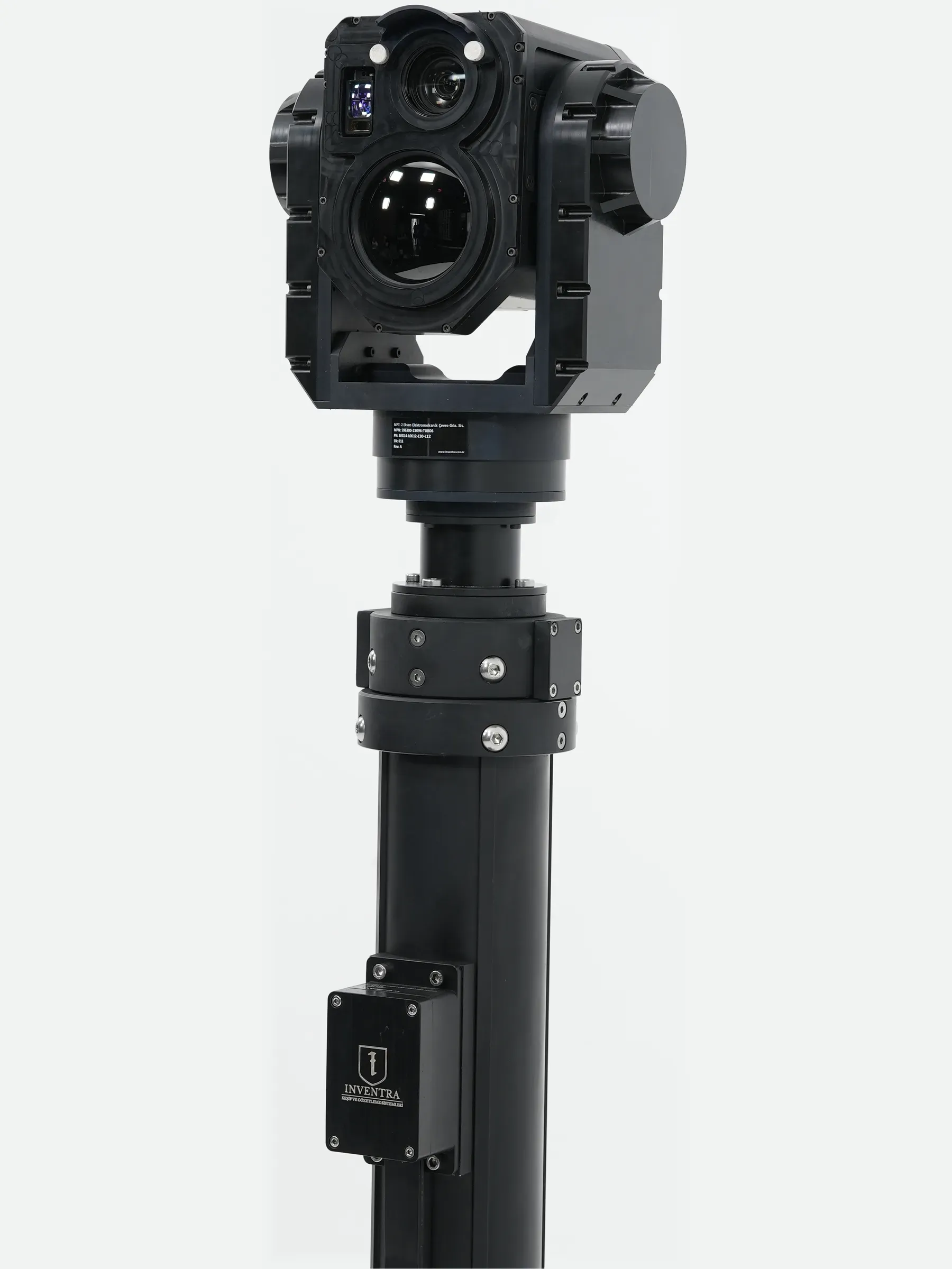 Shot of the SEG14 gimbal on top of an extended black mast section, viewed from front.