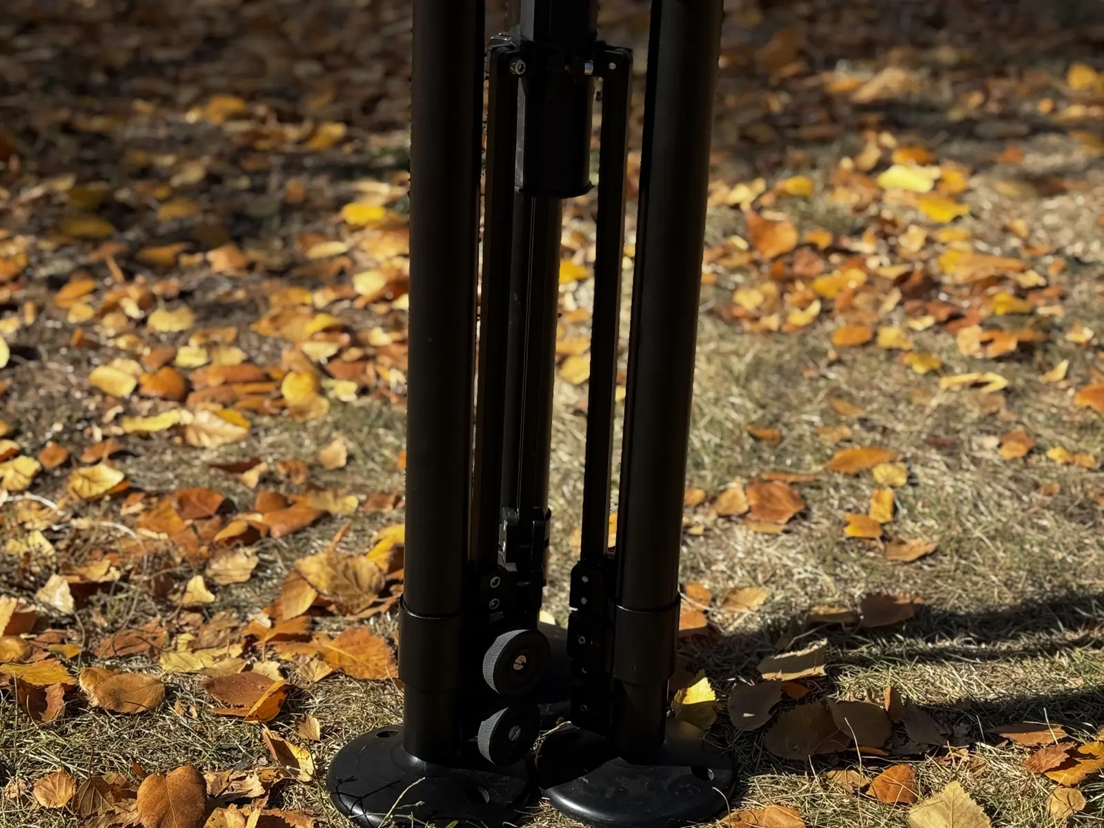 Tripod folded — transport and storage position, compact volume